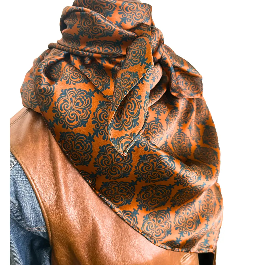 Western wild rag - Old western print with teal blue design on a sienna silk scarf.