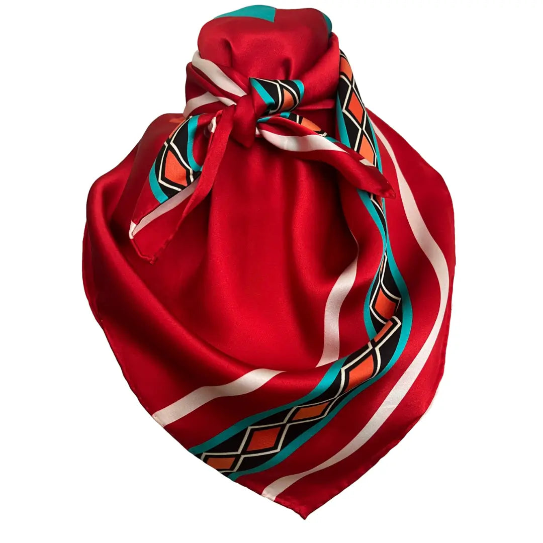 Red Aztec silk scarf with large print of cream, red, turquoise and adobe and orange.