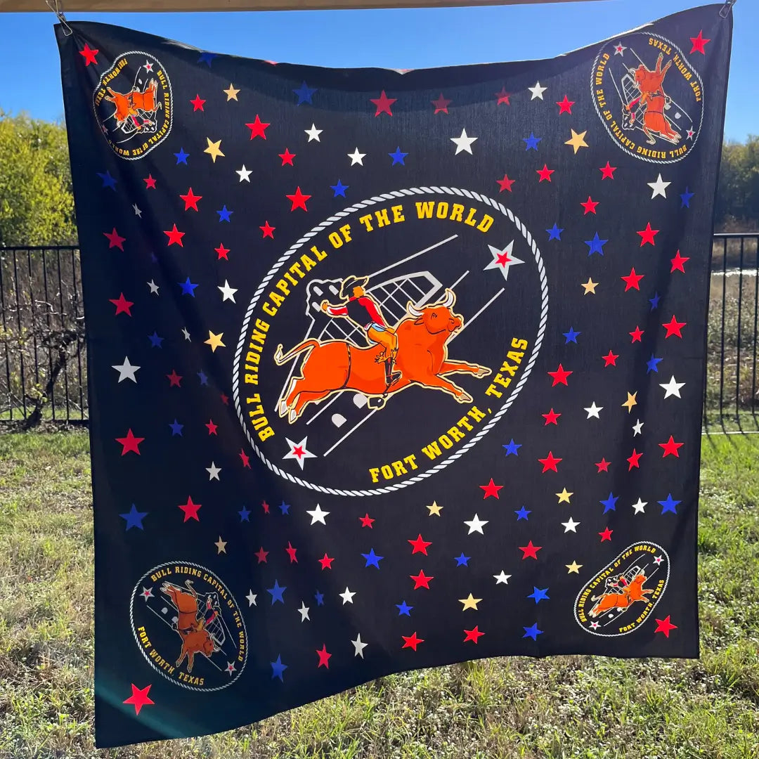 Bull Riding Capital of the World black cotton bandana with red and blue stars and bull riding capital logo.