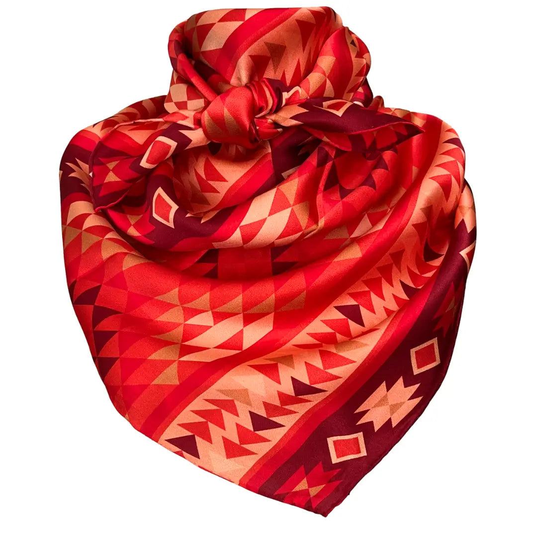 Aztec wild rag silk scarf with red, maroon, copper and peach.