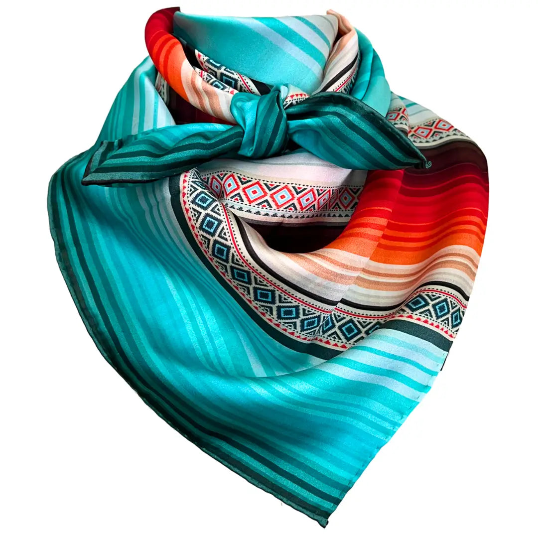 Cowtown Wild Rags turquoise serape silk scarf with blue, tan, maroon, orange, and coral.