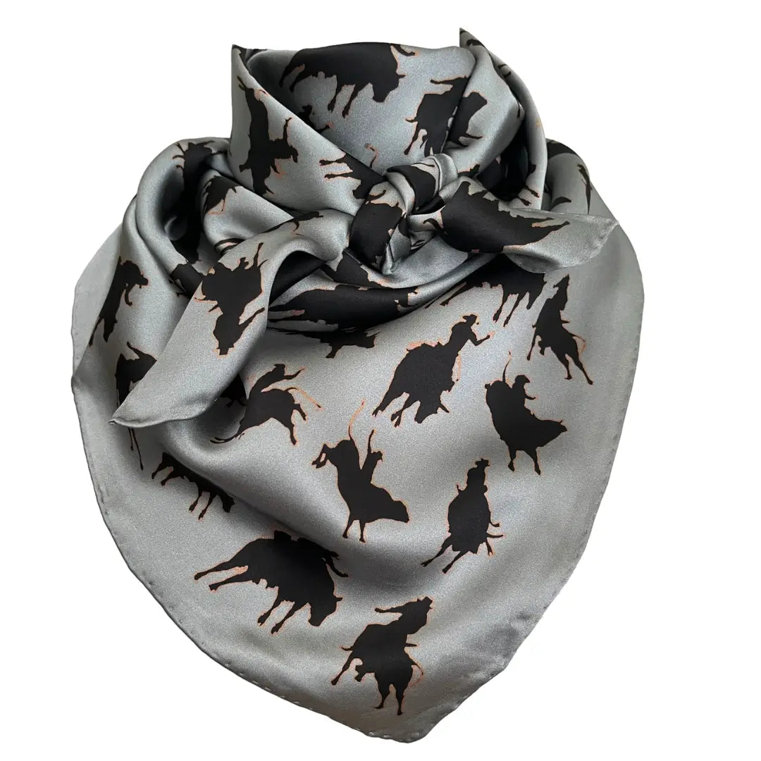 Black silhouette bull riders / bull riding outlined in tan on a gray silk scarf wild rag.