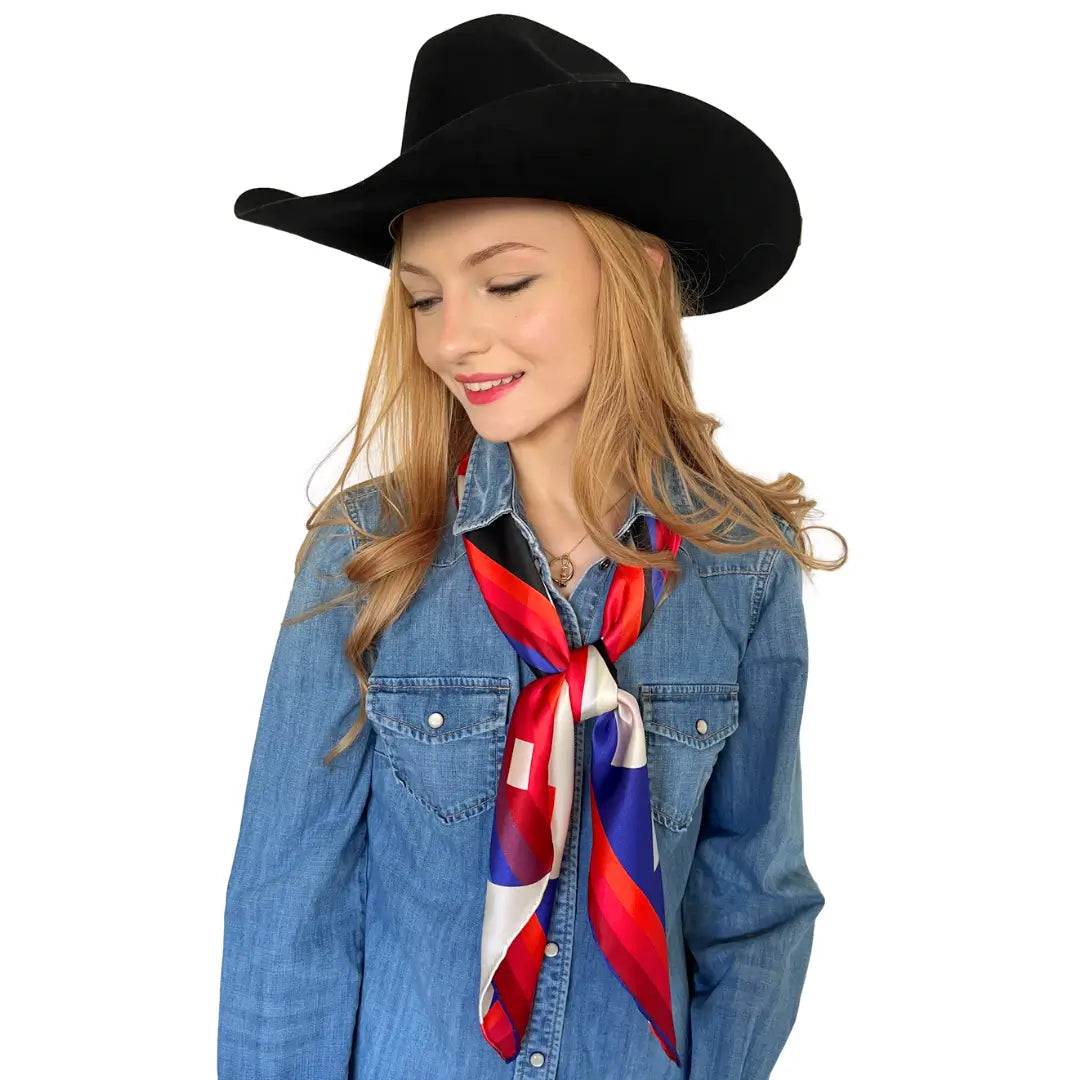 Cowtown Wild Rags - Aztec Red, Blue, and Orange Silk Scarf for Men and Women - Cowgirl wearing the Chasing Sunrise wild rag silk scarf. 