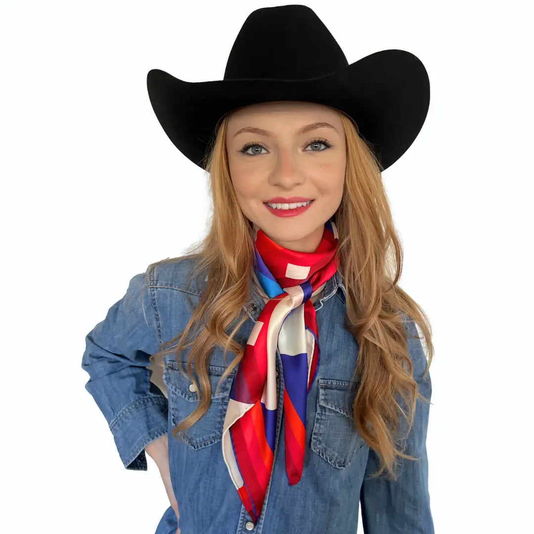 Cowtown Wild Rags - Aztec Red, Blue, and Orange Silk Scarf for Men and Women - Cowgirl wearing the Chasing Sunrise wild rag silk scarf. 