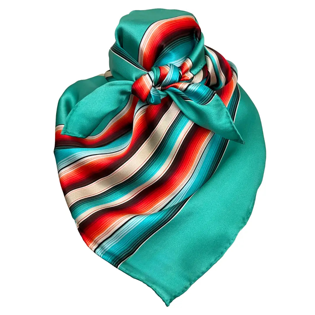 Cowtown Wild Rags turquoise serape silk scarf with tan, maroon, and coral.