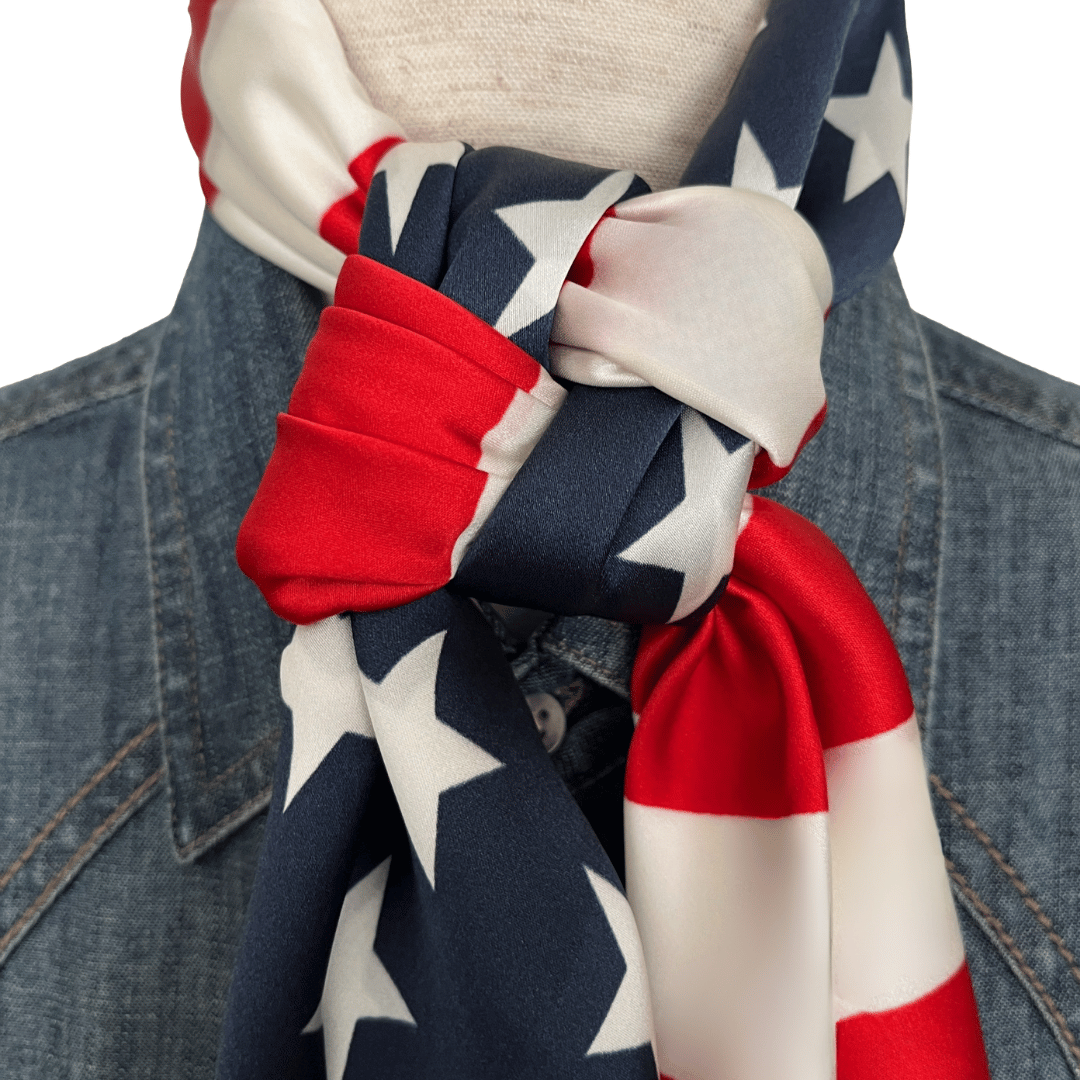 American flag silk scarf tied into a cowboy square knot