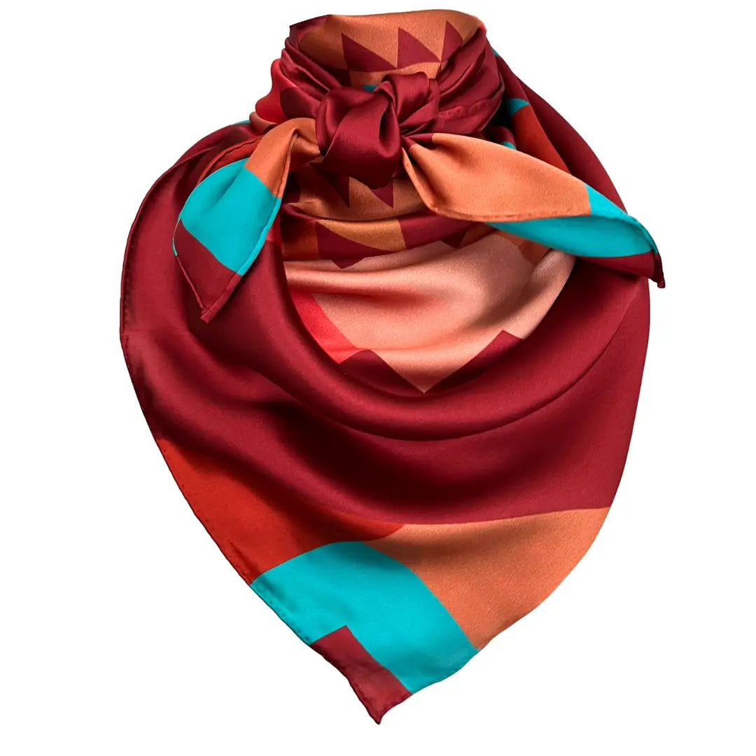 Cowtown Wild Rags maroon wild rag silk scarf with copper and turquoise.