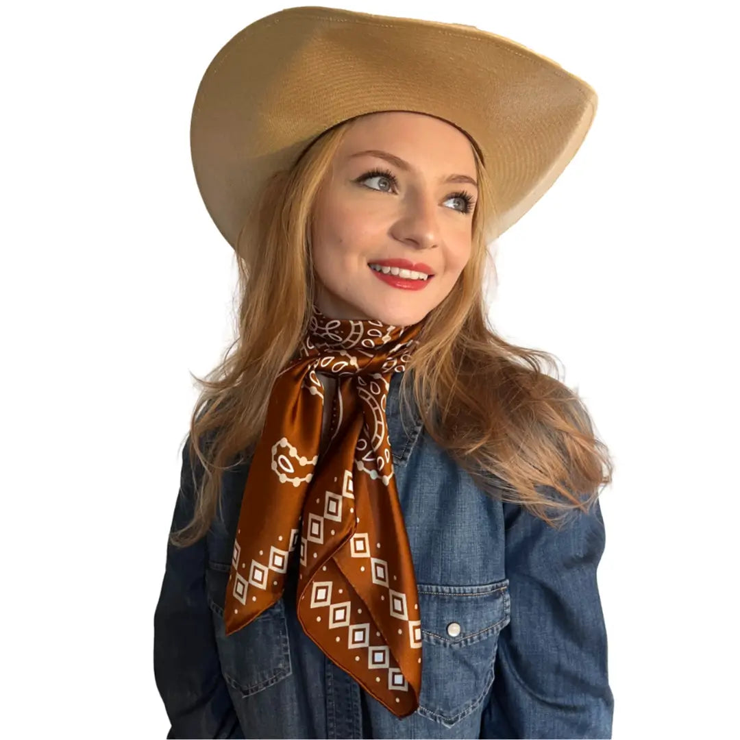 Cowtown Wild Rags Light Tan Paisley on Sienna Silk Scarf for Men and Women - Cowboy Western Bandana Scarves - Model wearing the sienna silk scarf.