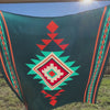 Video of Teal Blue Aztec silk scarf with large print of cream, red, turquoise and adobe orange.