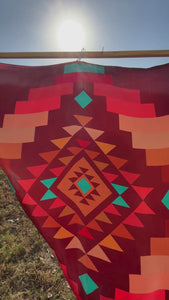 Video of Cowtown Wild Rags maroon wild rag silk scarf with copper and turquoise.